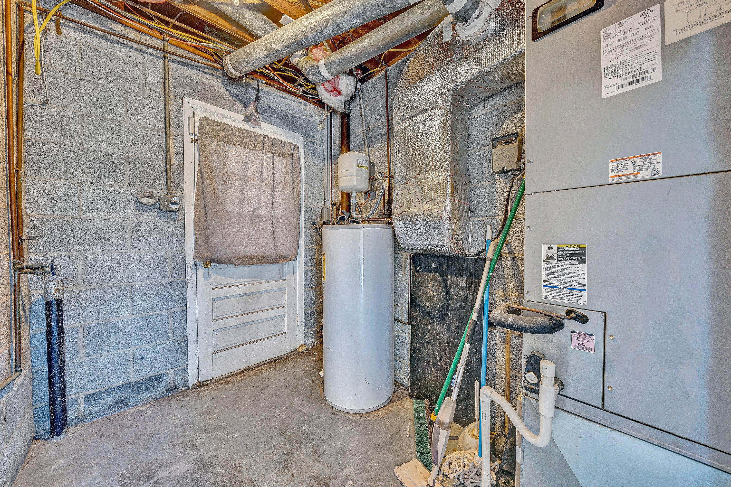 1633 Angus Road Northwest Roanoke, VA 24017 - Photo 18 of 22 a view of water heater room