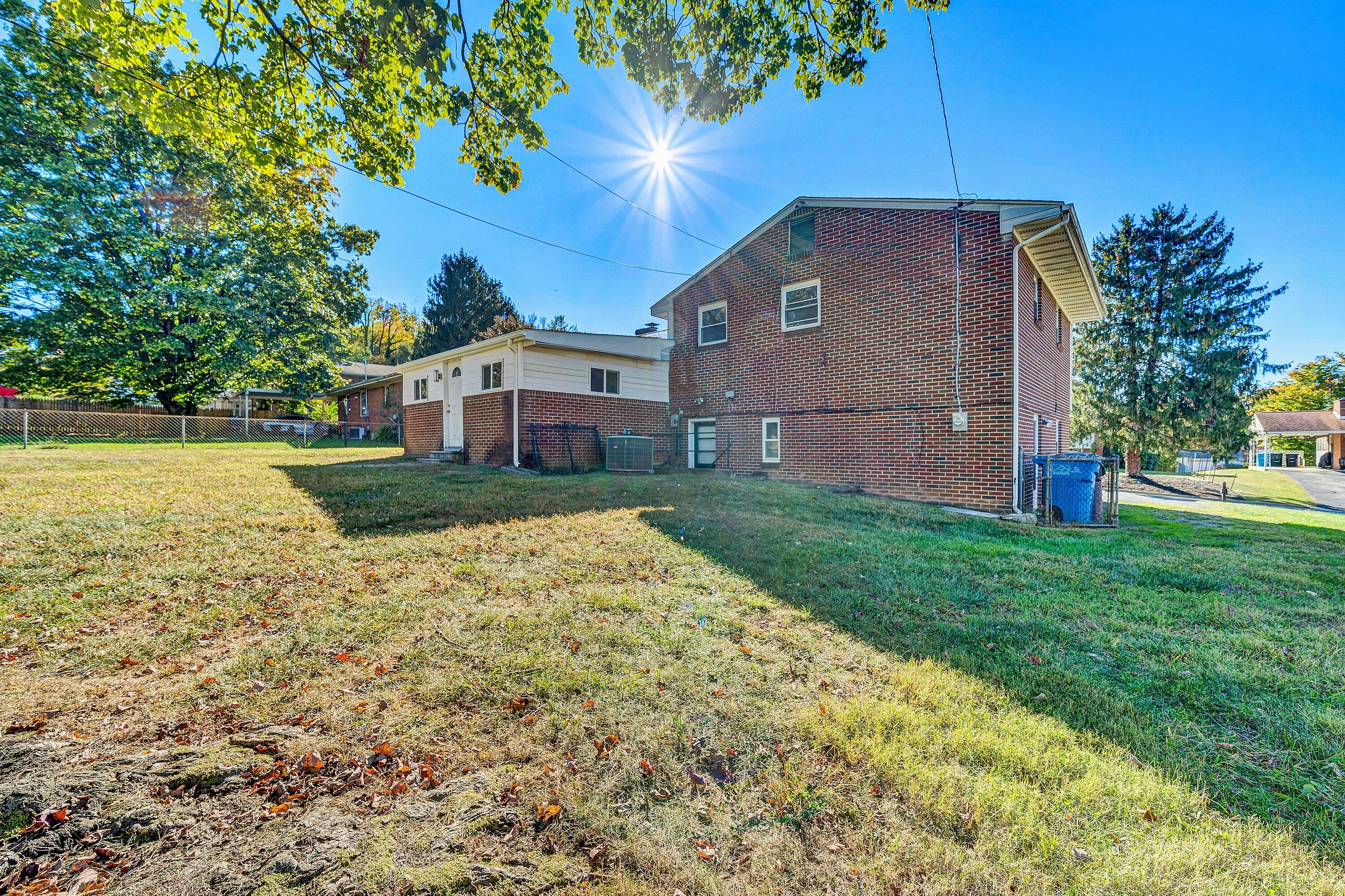 1633 Angus Road Northwest Roanoke, VA 24017 - Photo 21 of 22 a front view of a house with garden