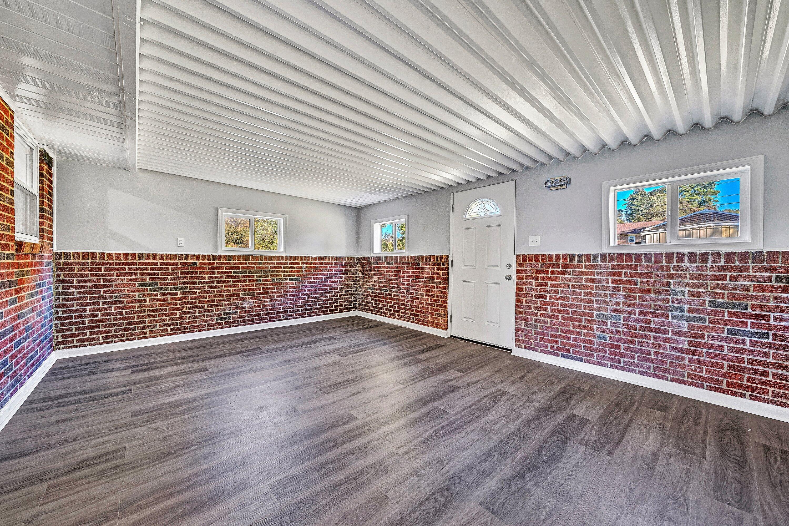 1633 Angus Road Northwest Roanoke, VA 24017 - Photo 8 of 22 a view of an empty room with wooden floor