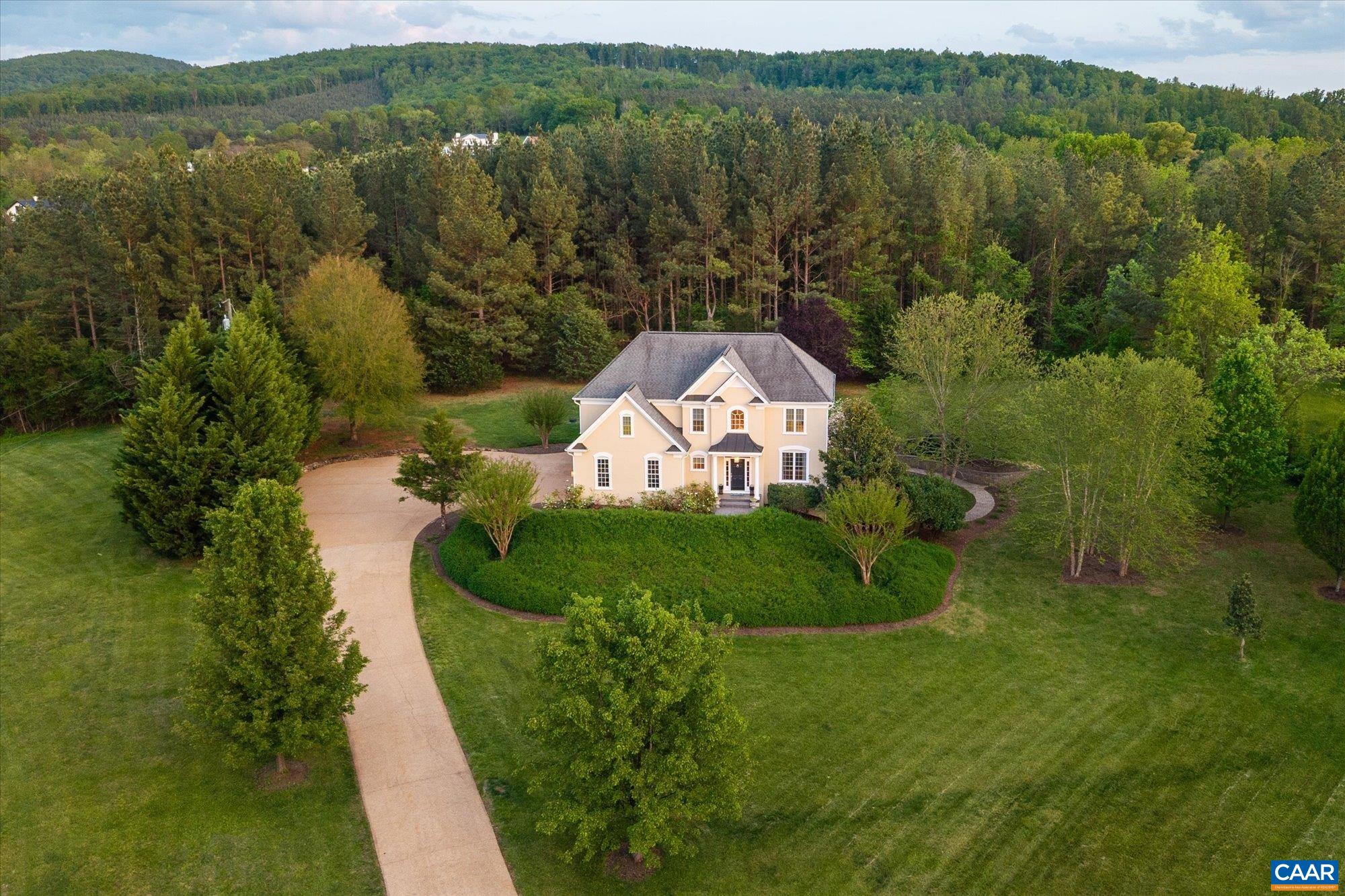 4269 Stony Point Road Keswick, VA 22947 - Photo 2 of 25 an aerial view of a house with a yard and green space