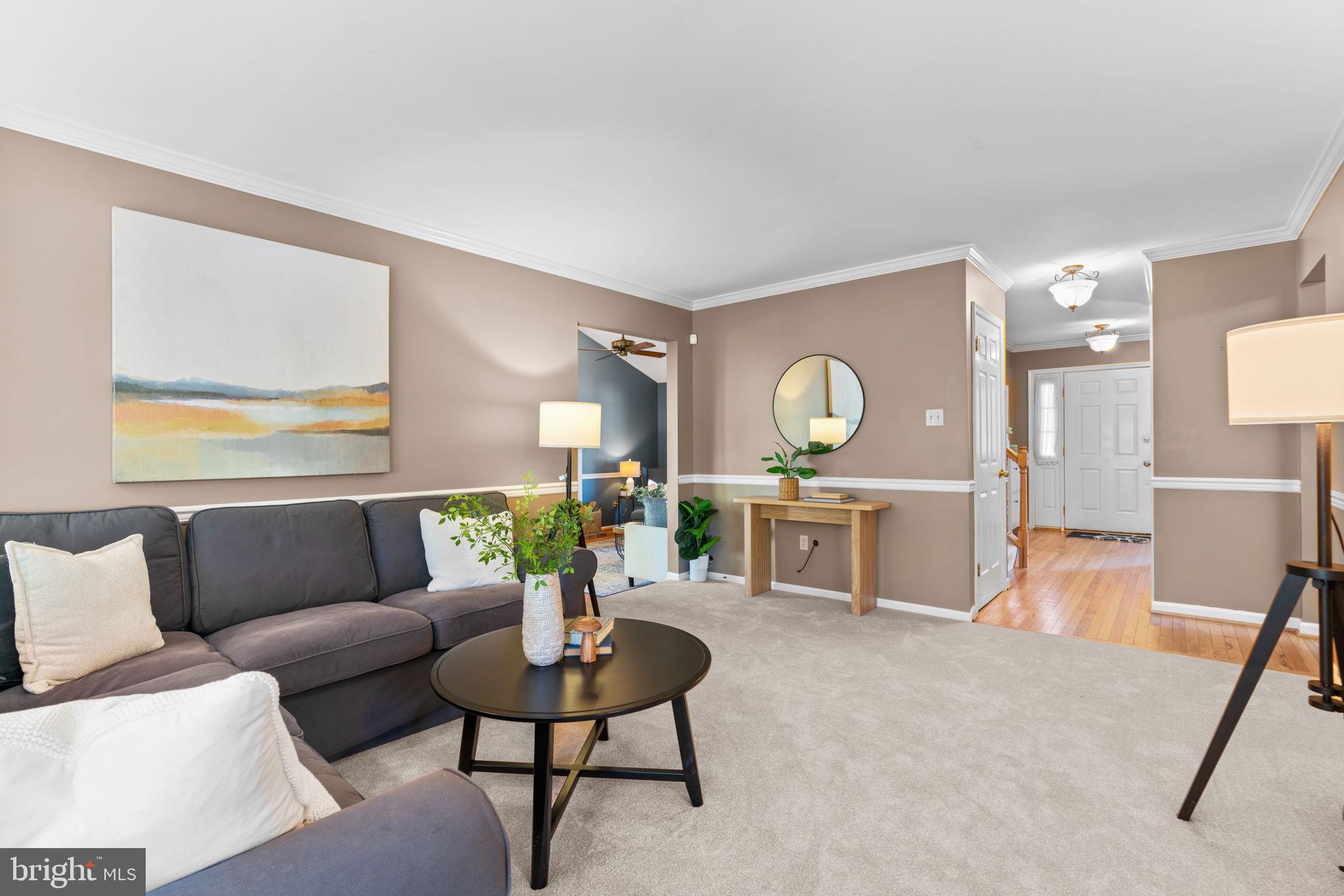 311 Canterfield Road Annapolis, MD 21403 - Photo 16 of 49 a living room with furniture and a wooden floor