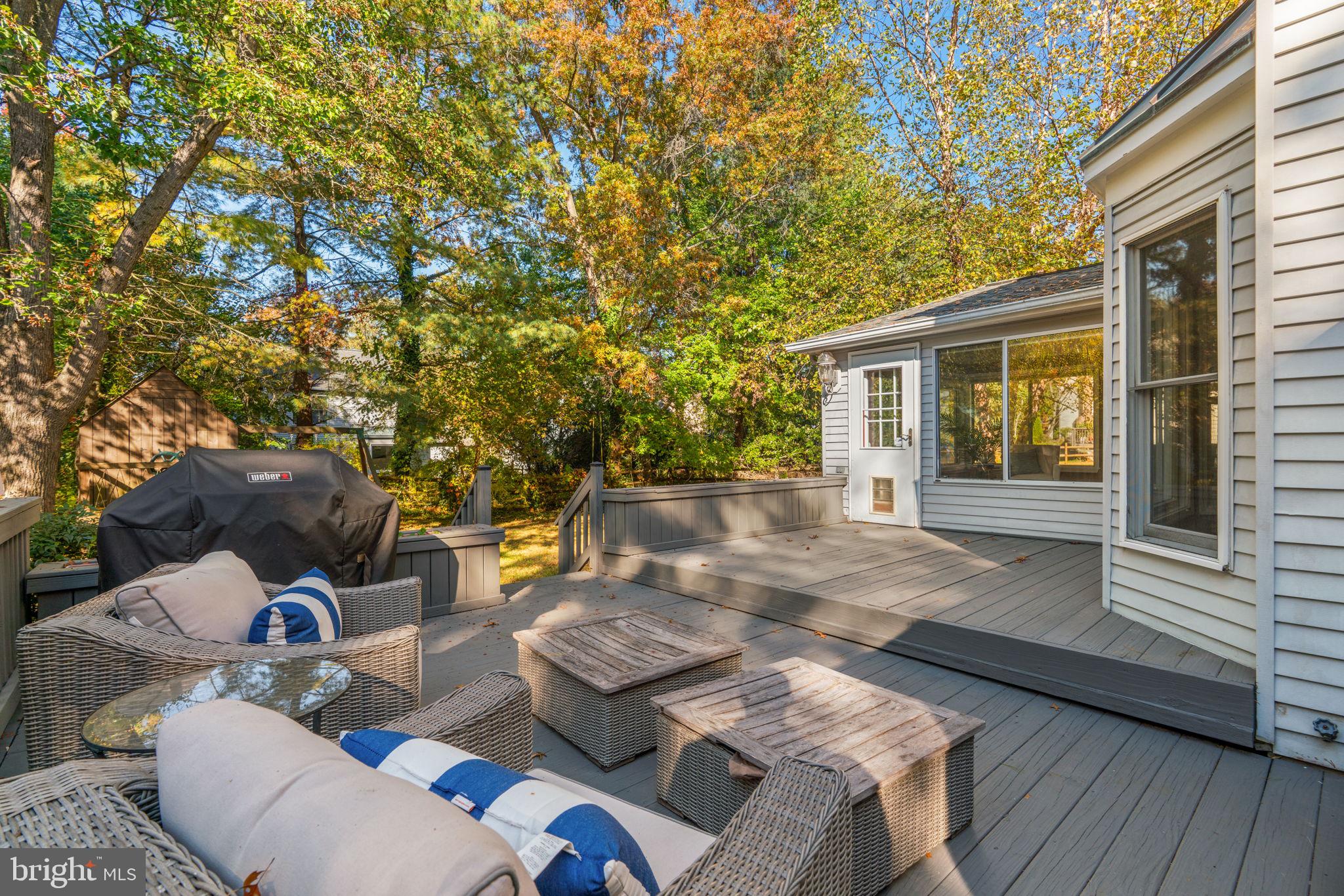 311 Canterfield Road Annapolis, MD 21403 - Photo 39 of 49 a view of backyard of house with seating space