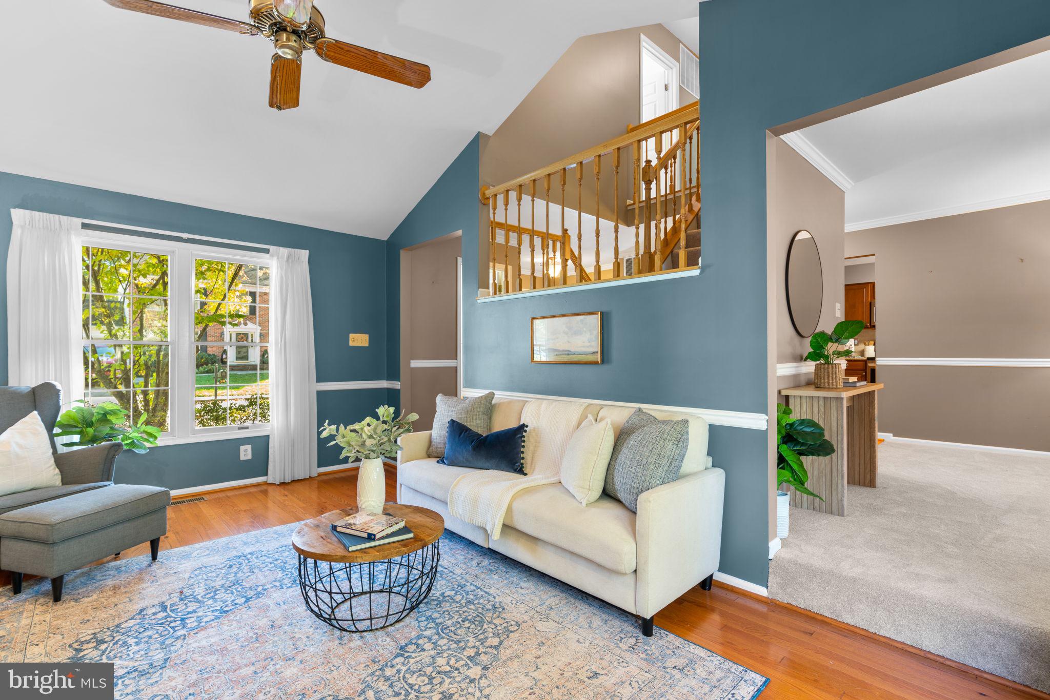 311 Canterfield Road Annapolis, MD 21403 - Photo 4 of 49 a living room with furniture and a potted plant