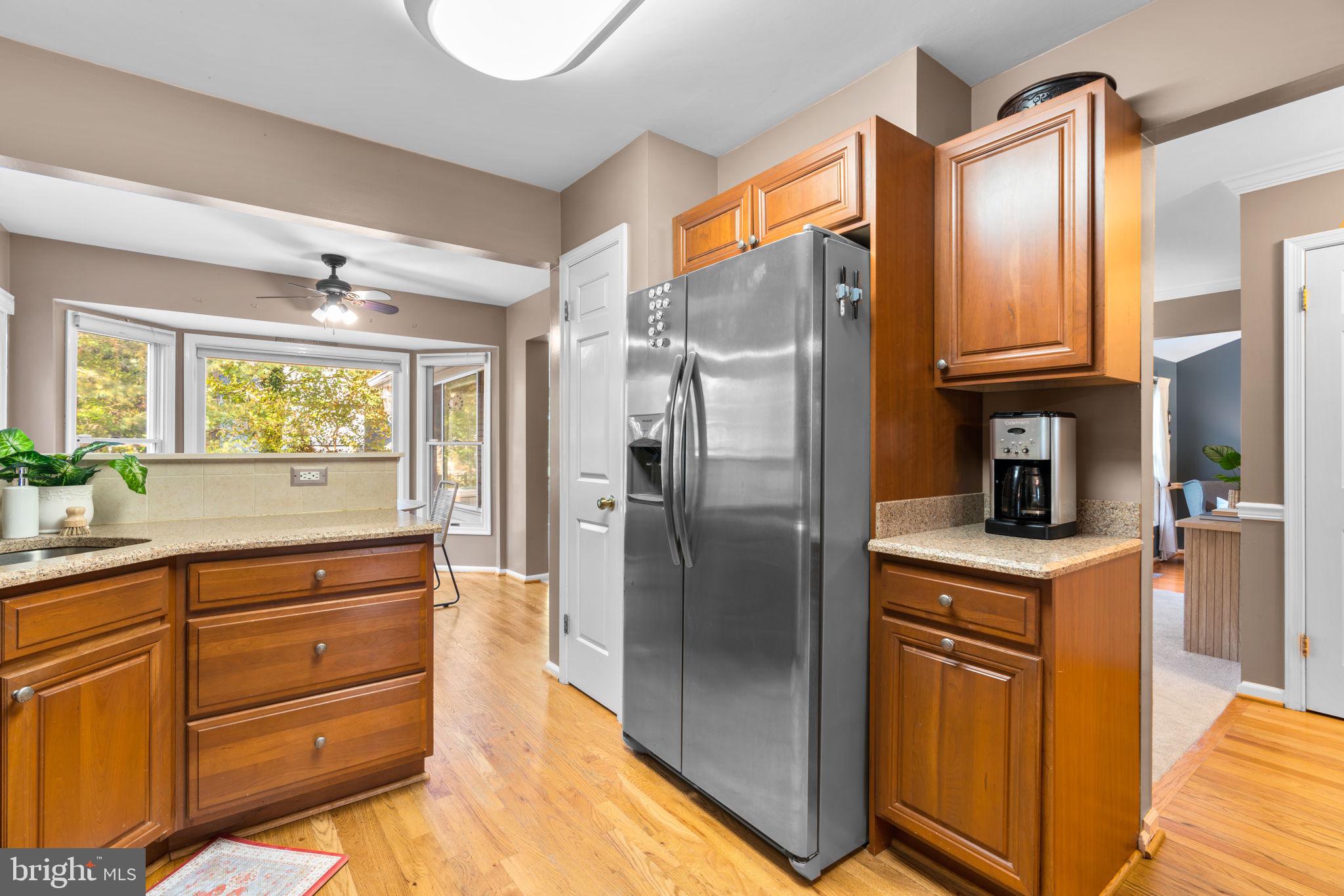 311 Canterfield Road Annapolis, MD 21403 - Photo 9 of 49 a kitchen with stainless steel appliances granite countertop a refrigerator and a sink