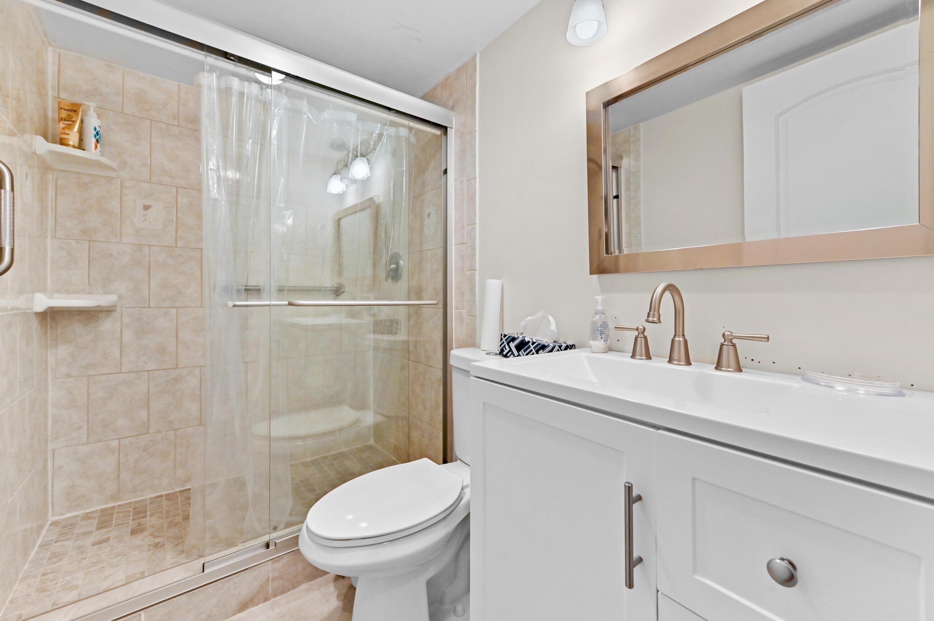 5540 North Ocean Boulevard, Unit 107 Ocean Ridge, FL 33435 - Photo 18 of 26 20 Bathroom 03