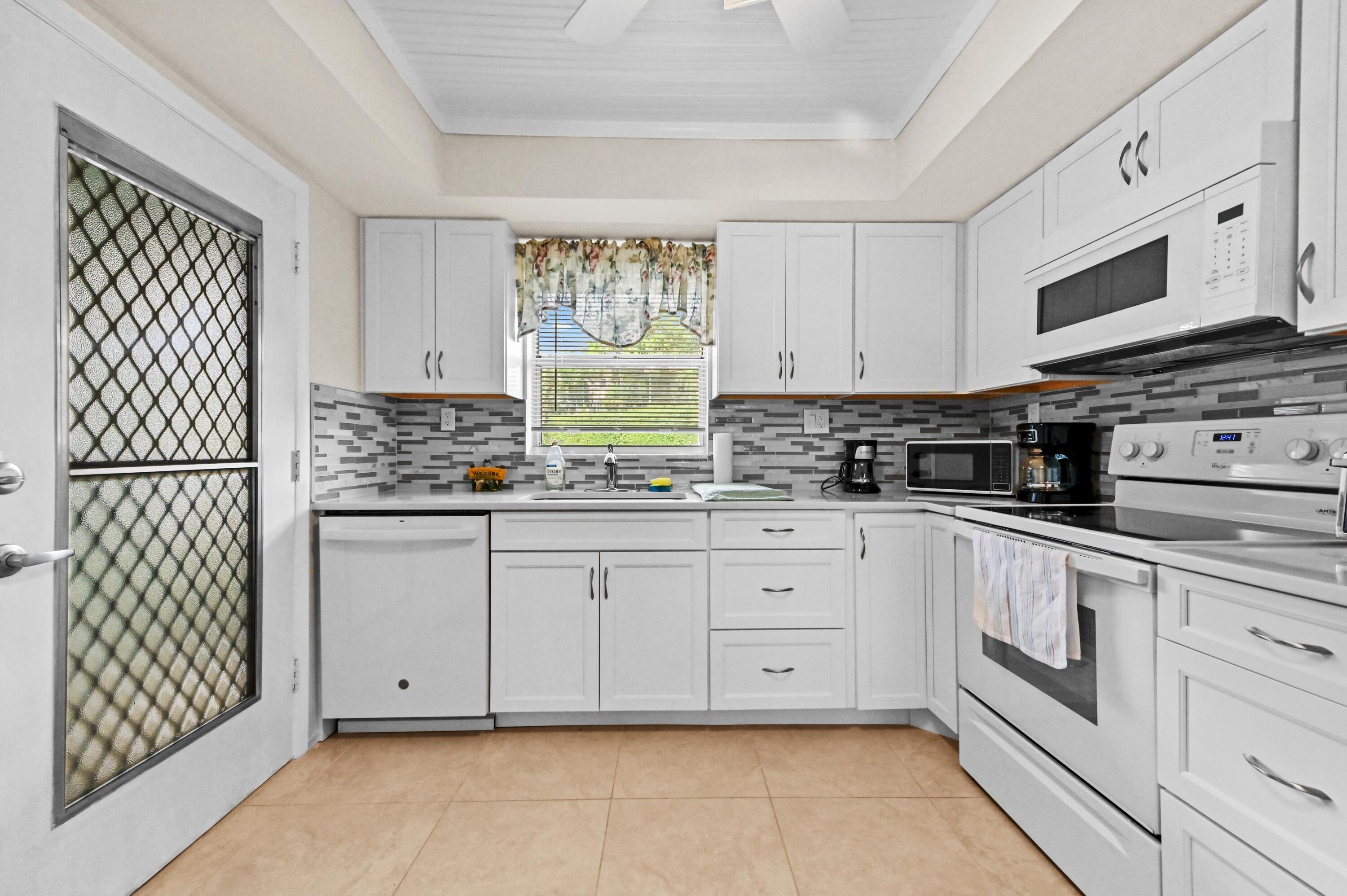 5540 North Ocean Boulevard, Unit 107 Ocean Ridge, FL 33435 - Photo 8 of 26 10 Kitchen 02