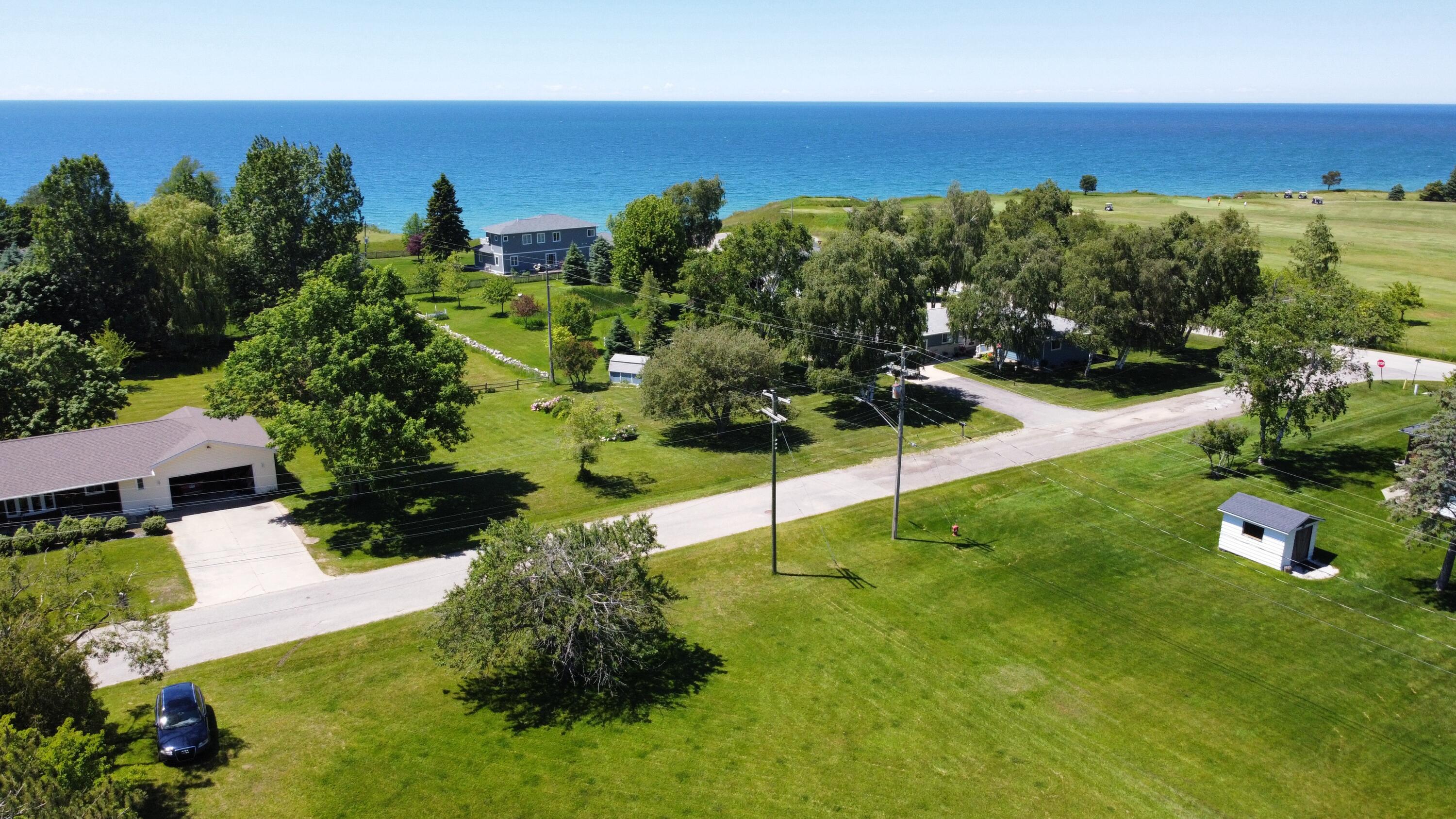 0 Pearce Road Manistee, MI 49660 - Photo 1 of 20 dji_fly_20240614_144950_317_171839115511