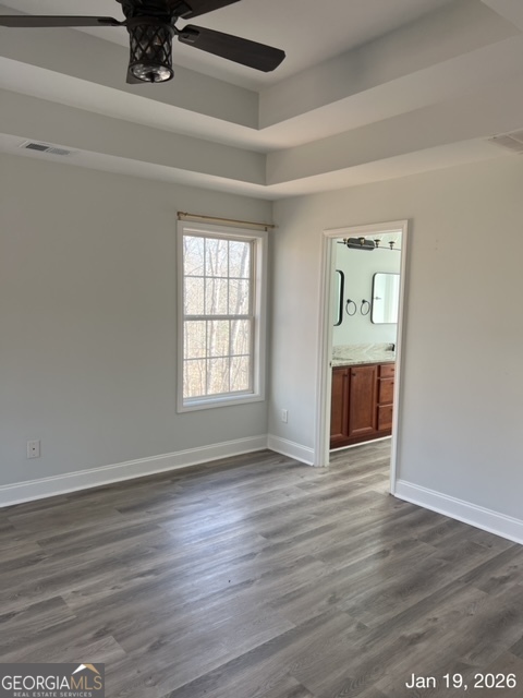 522 Anniston Drive Athens, GA 30607 - Photo 11 of 19 an empty room with wooden floor and windows