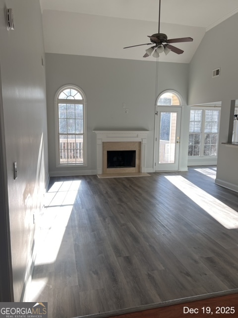 522 Anniston Drive Athens, GA 30607 - Photo 12 of 19 a view of a livingroom with a fireplace wooden floor and windows