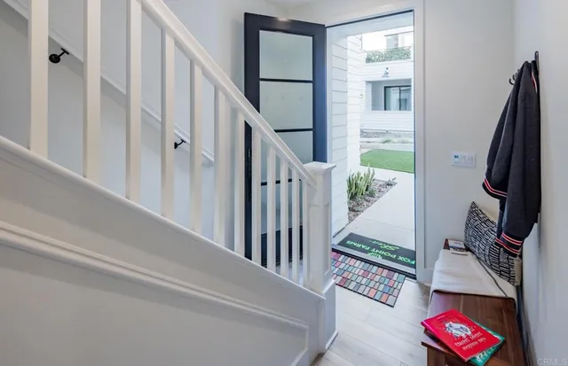 a view of an entryway with staircase