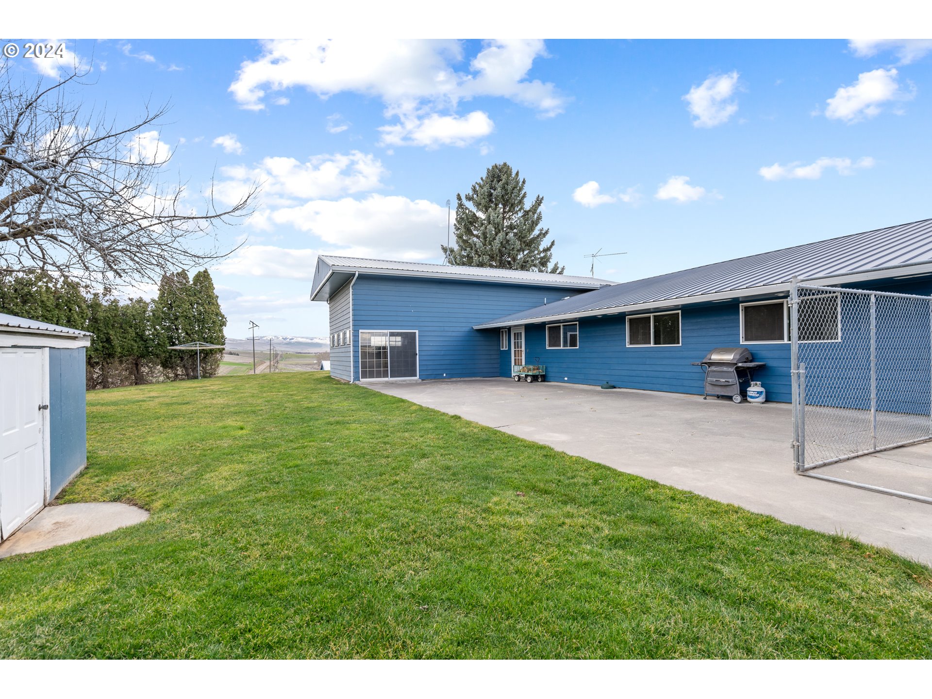 69748 Shaw Road Pendleton, OR 97801 - Photo 15 of 48 a view of an house with backyard space and garden