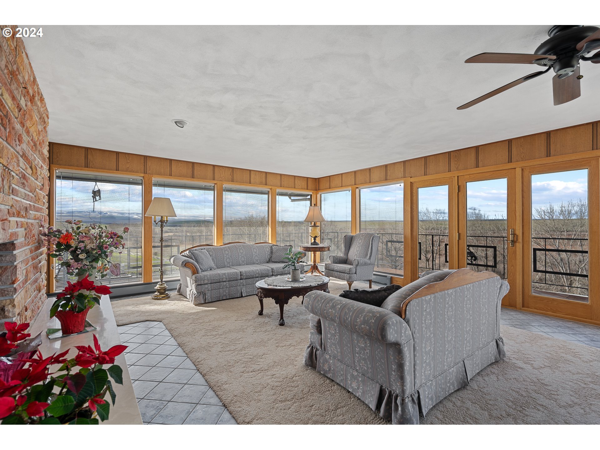 69748 Shaw Road Pendleton, OR 97801 - Photo 20 of 48 a living room with furniture and a floor to ceiling window