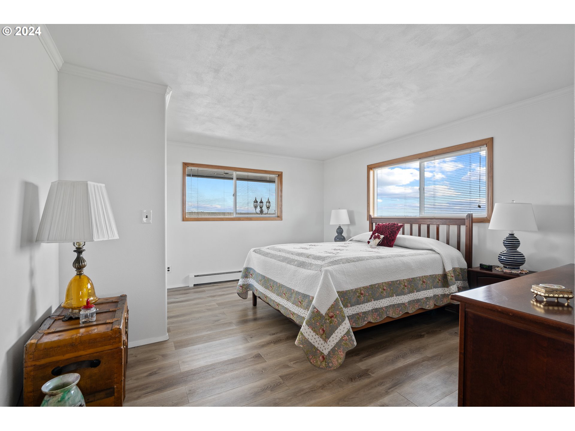 69748 Shaw Road Pendleton, OR 97801 - Photo 28 of 48 a bedroom with a bed and wooden floor
