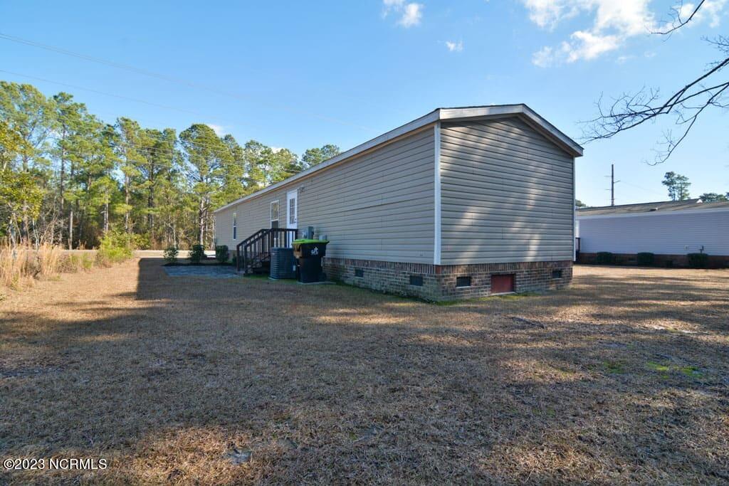1189 Clariday Road Southwest Calabash, NC 28467 - Photo 6 of 22 rear-right