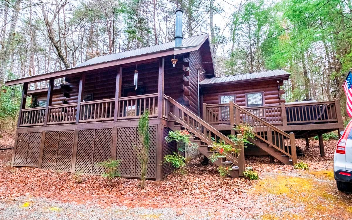 1014 Joann Sisson Road Blue Ridge, GA 30513 - Photo 1 of 1 a front view of a house with a yard