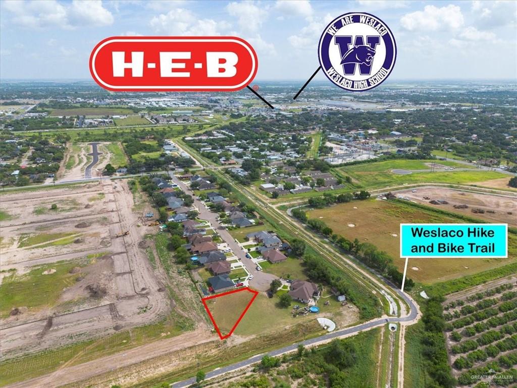 0 Windcrest Drive Weslaco, TX 78596 - Photo 3 of 5 a view of swimming pool with a fire pit and wooden fence