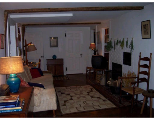 20 Kelsey Road Boxford, MA 01921 - Photo 6 of 8 a living room with furniture and a fireplace