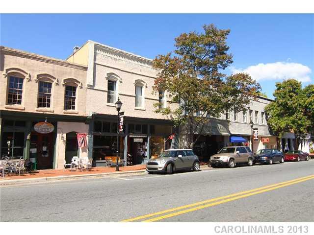 126 South Main Street, Unit 2B Davidson, NC 28036 - Photo 1 of 5 a view of a cars parked on the side of a street