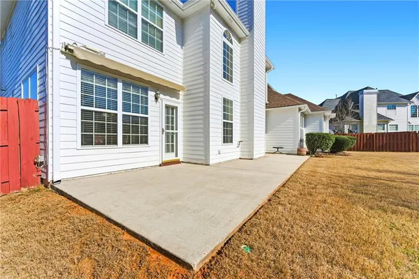 a house view with a backyard