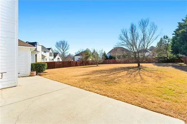 a house with trees in front of it