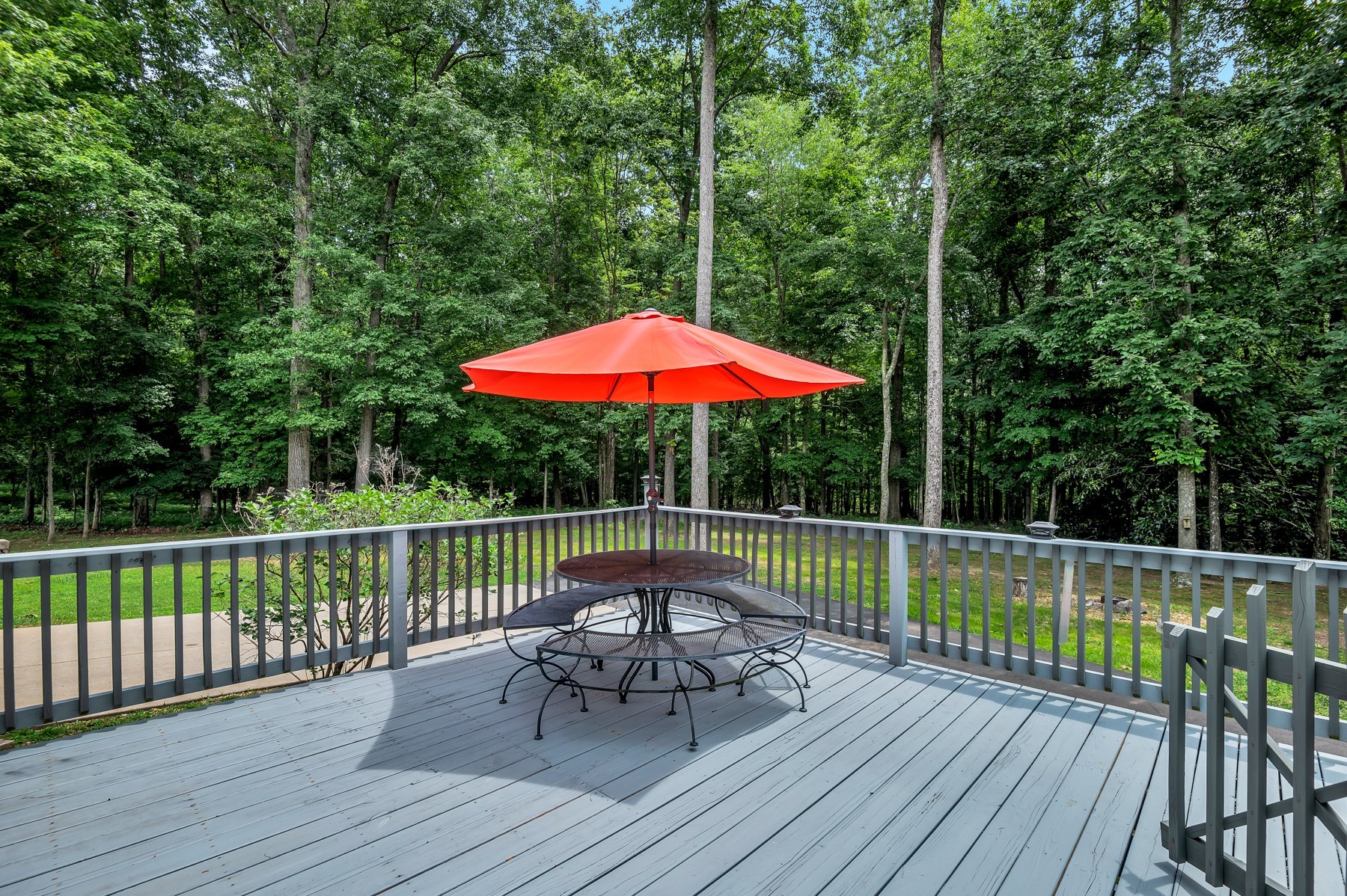 4949 Homer Worsham Road Springfield, TN 37172 - Photo 13 of 33 a view of deck with furniture and umbrella