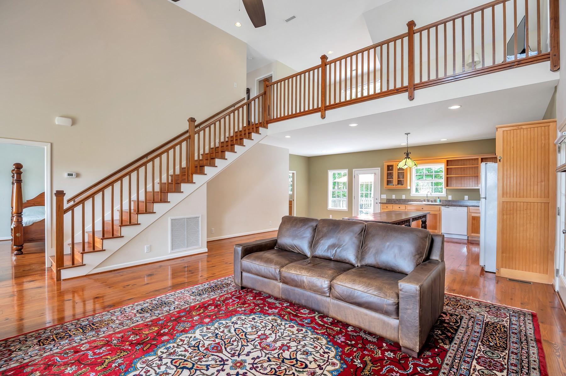4949 Homer Worsham Road Springfield, TN 37172 - Photo 22 of 33 a living room with furniture or stairs and a rug