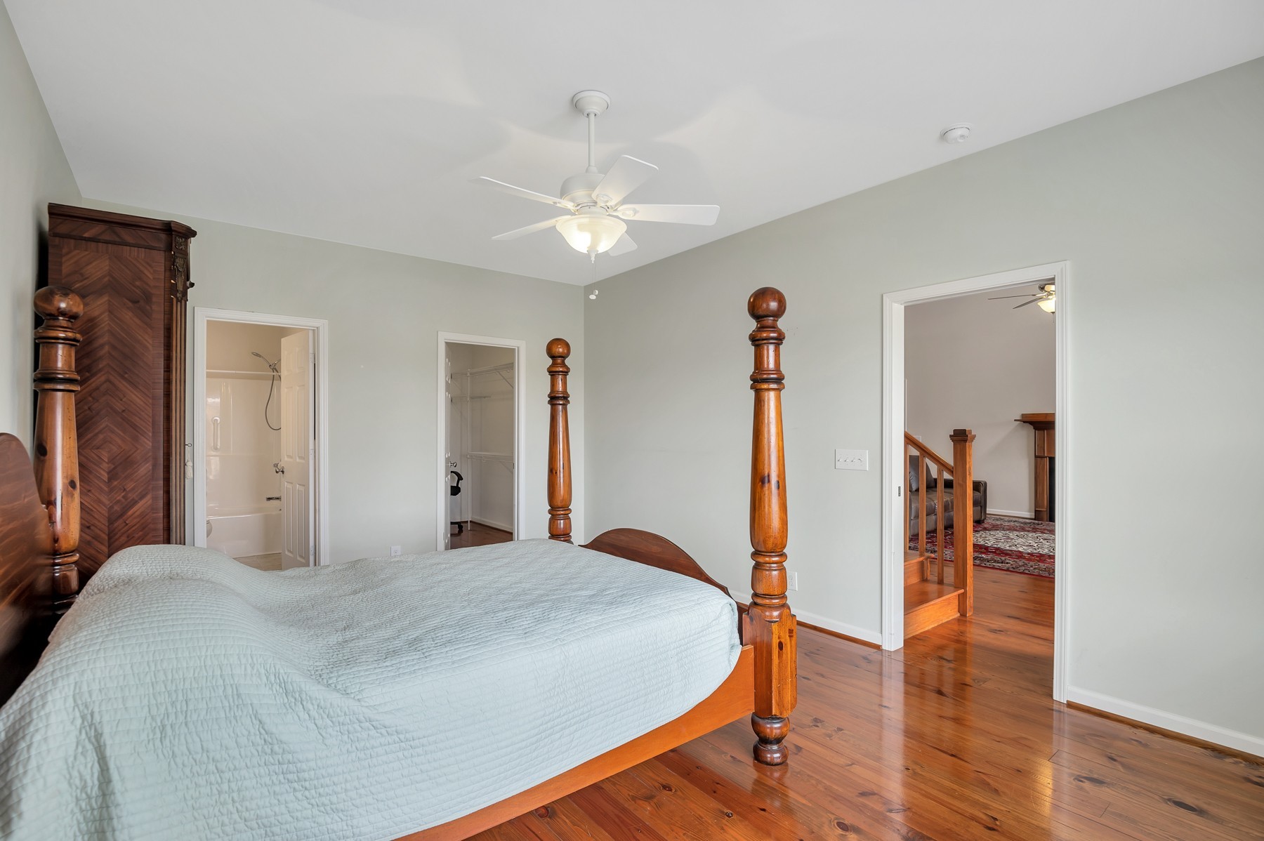 4949 Homer Worsham Road Springfield, TN 37172 - Photo 24 of 33 a bedroom with a bed and a chandelier