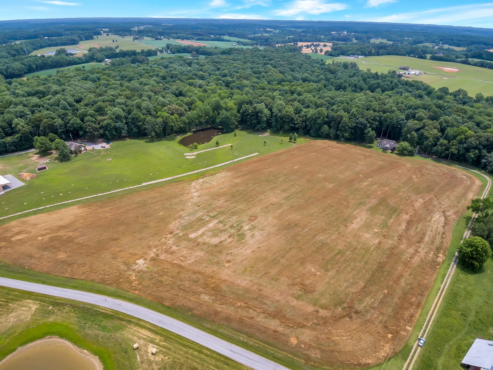 4949 Homer Worsham Road Springfield, TN 37172 - Photo 3 of 33 a view of a back yard of a house with a yard