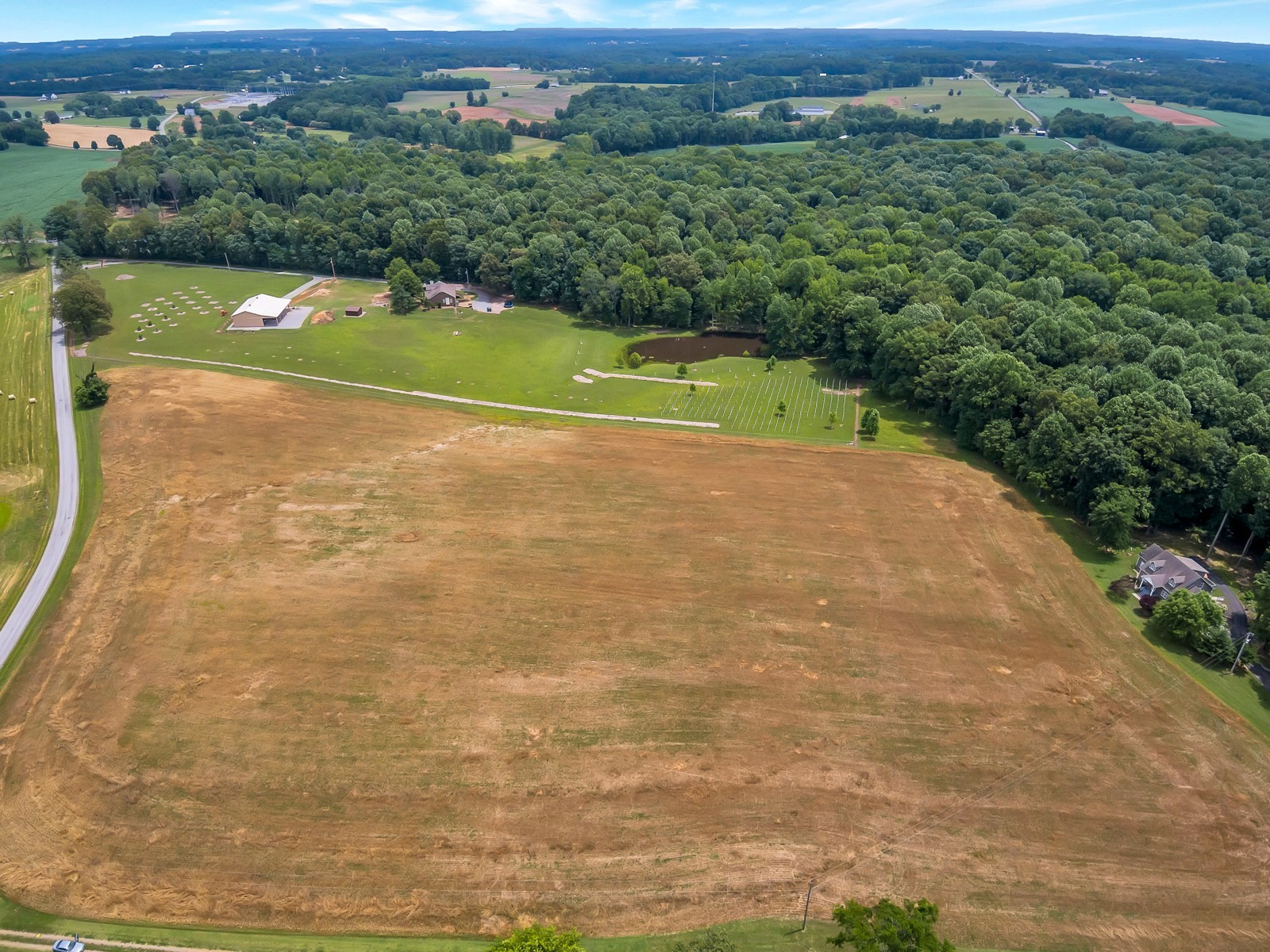 4949 Homer Worsham Road Springfield, TN 37172 - Photo 6 of 33 a view of a big yard with potted plants