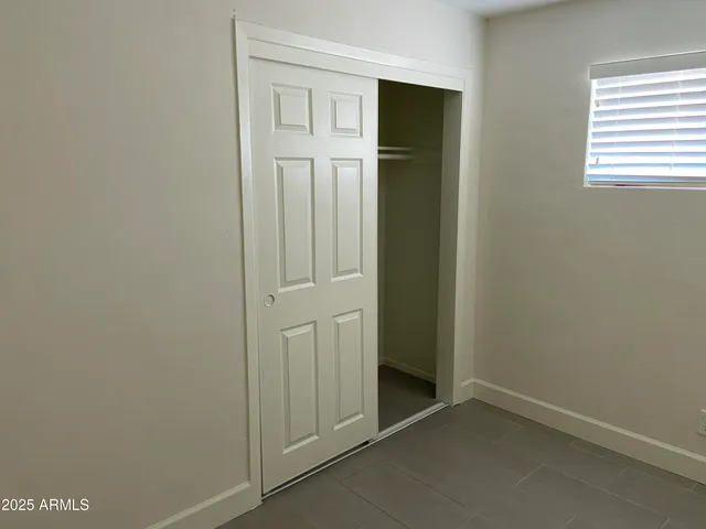 a view of a room with white door