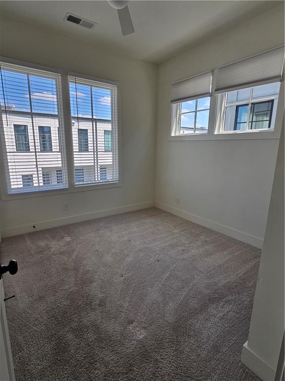 1294 Longreen Terrace Northwest, Unit 2 Atlanta, GA 30318 - Photo 17 of 25 a view of an empty room with a window