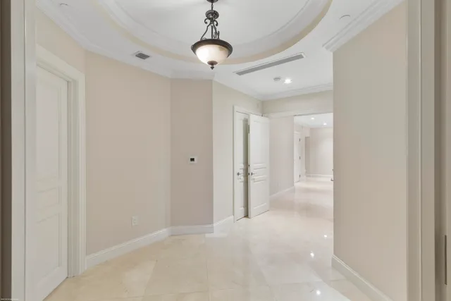 a bathroom with a shower and a glass door