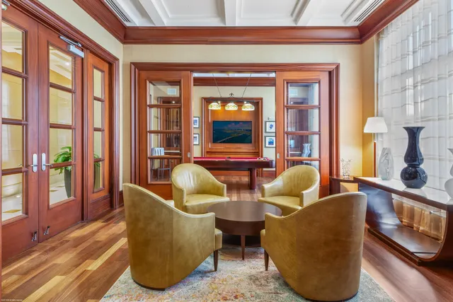 a black and white photo of a living room