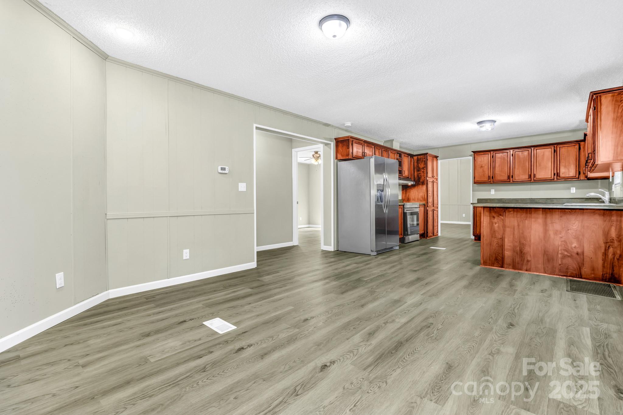 80 Winter Lane, Unit 8&11 Mill Spring, NC 28756 - Photo 26 of 41 a view of a room with wooden floor and staircase