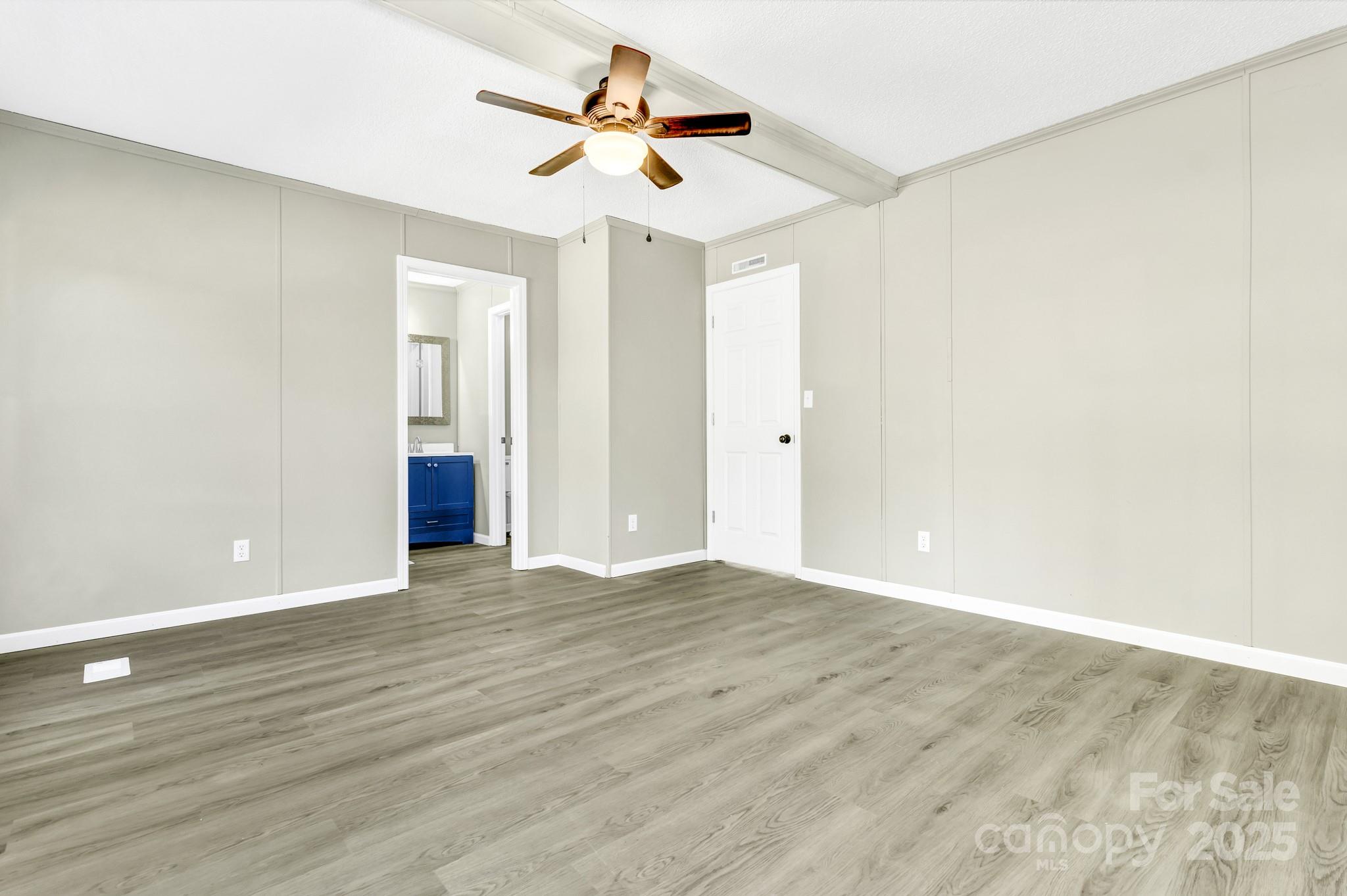 80 Winter Lane, Unit 8&11 Mill Spring, NC 28756 - Photo 28 of 41 wooden floor in an empty room
