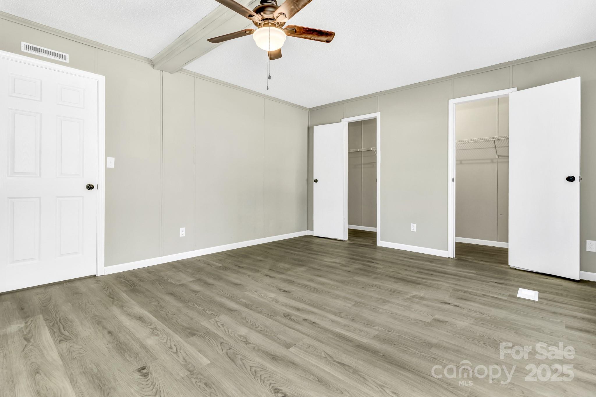 80 Winter Lane, Unit 8&11 Mill Spring, NC 28756 - Photo 29 of 41 a view of an empty room with wooden floor