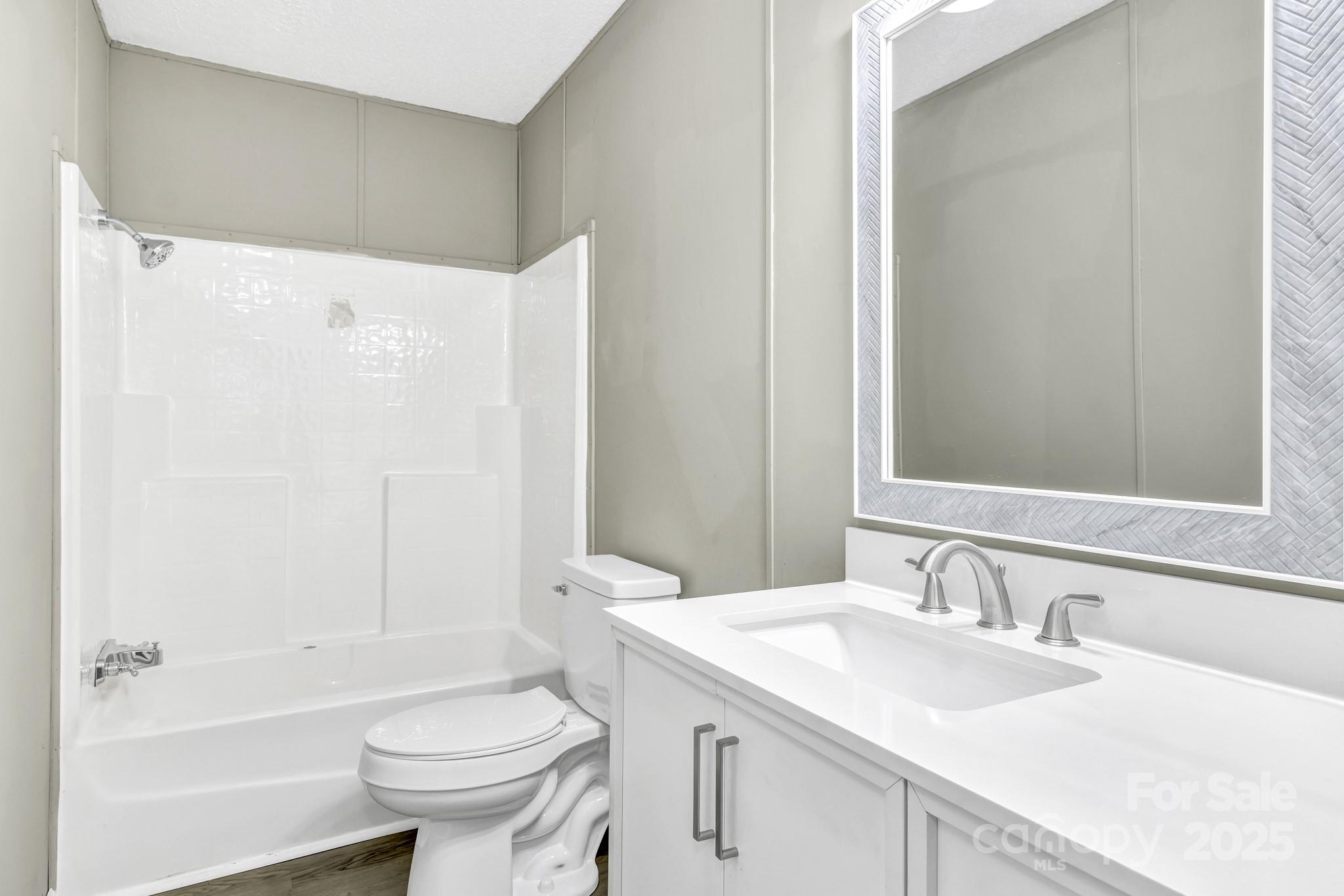 80 Winter Lane, Unit 8&11 Mill Spring, NC 28756 - Photo 32 of 41 a bathroom with a sink toilet tub and shower