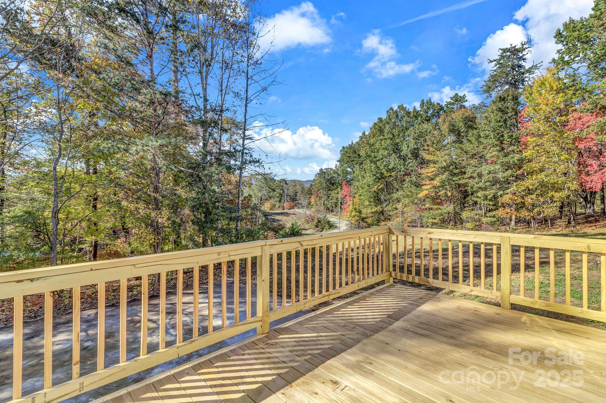 80 Winter Lane, Unit 8&11 Mill Spring, NC 28756 - Photo 40 of 41 a view of a balcony with wooden fence
