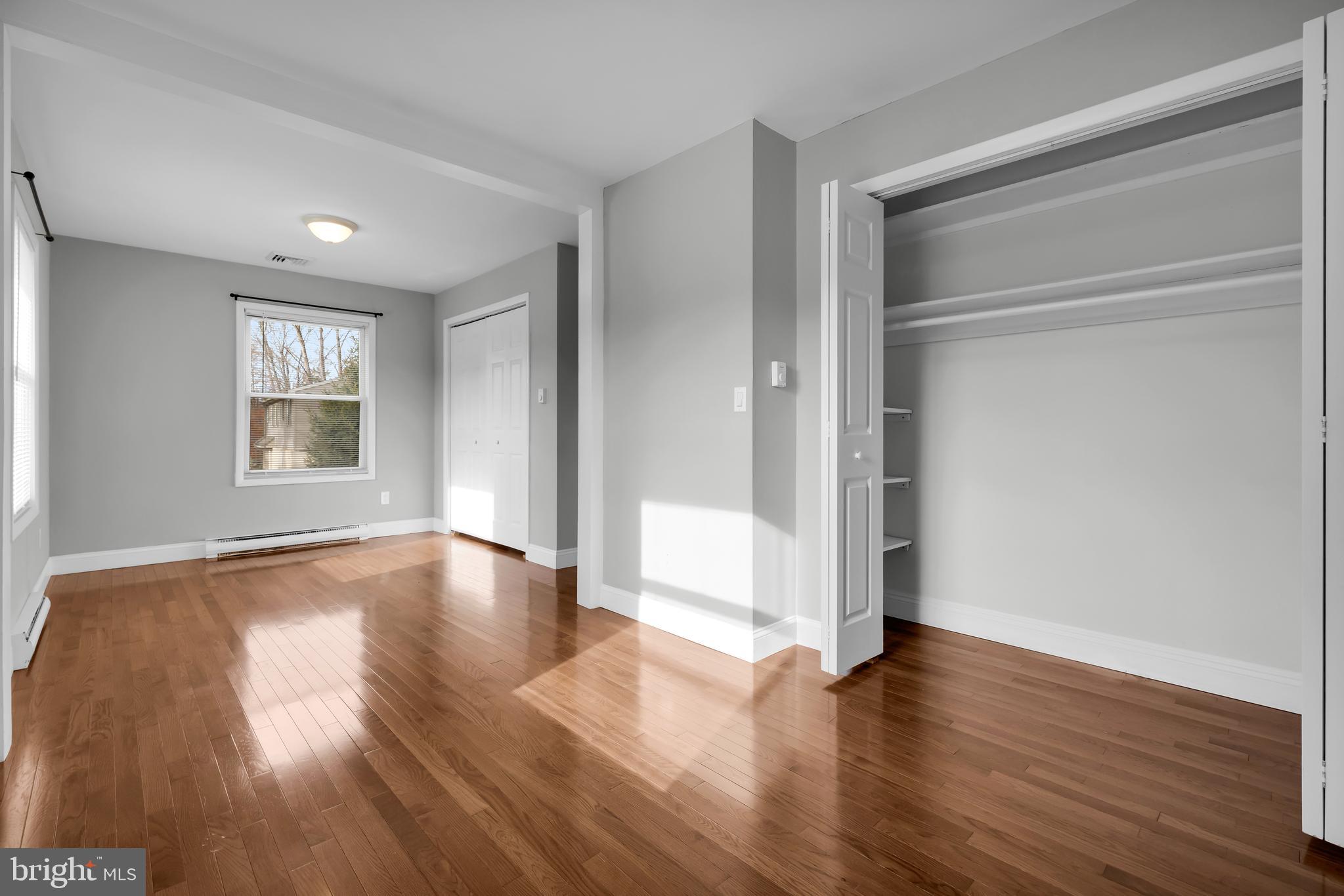 8979 Easton Road Ottsville, PA 18942 - Photo 14 of 39 a view of an empty room with wooden floor and a window