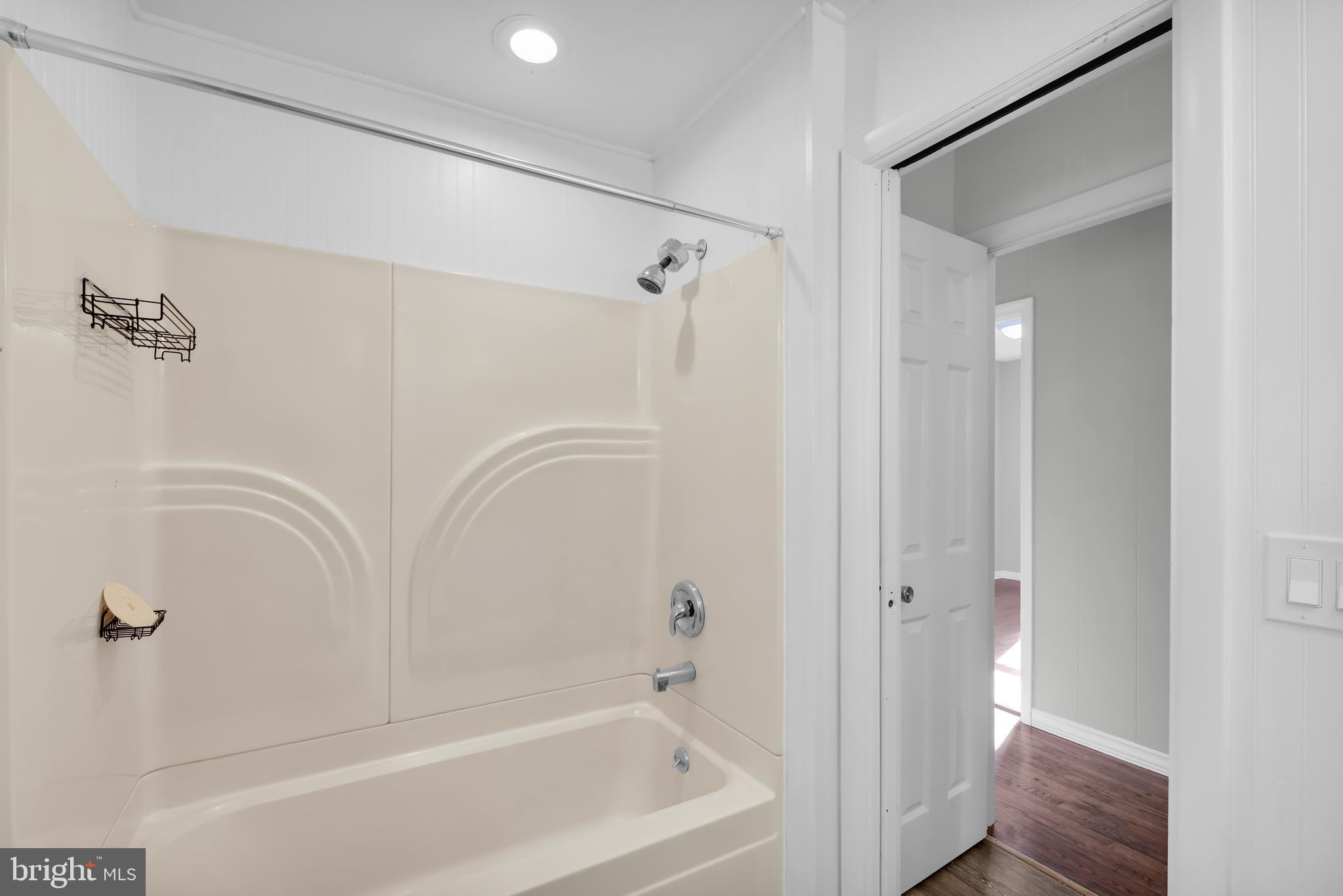 8979 Easton Road Ottsville, PA 18942 - Photo 22 of 39 a bathroom with a bathtub