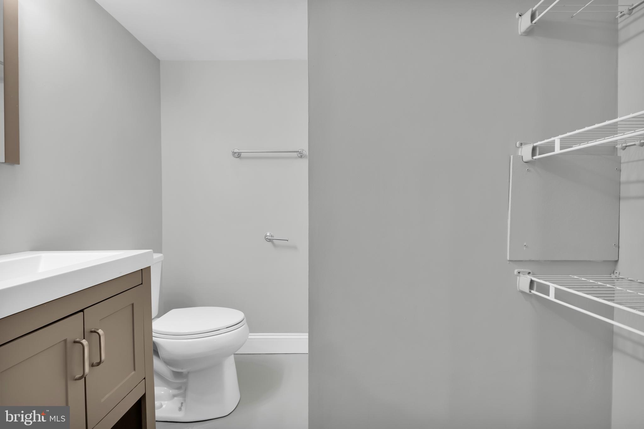 8979 Easton Road Ottsville, PA 18942 - Photo 27 of 39 a white toilet sitting next to a bathroom sink