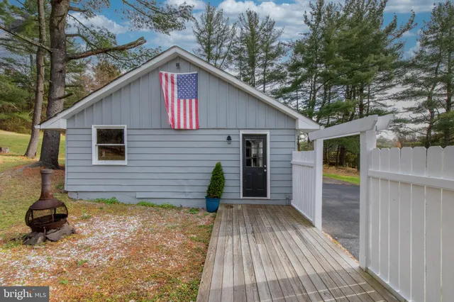 a backyard of a house with seating space