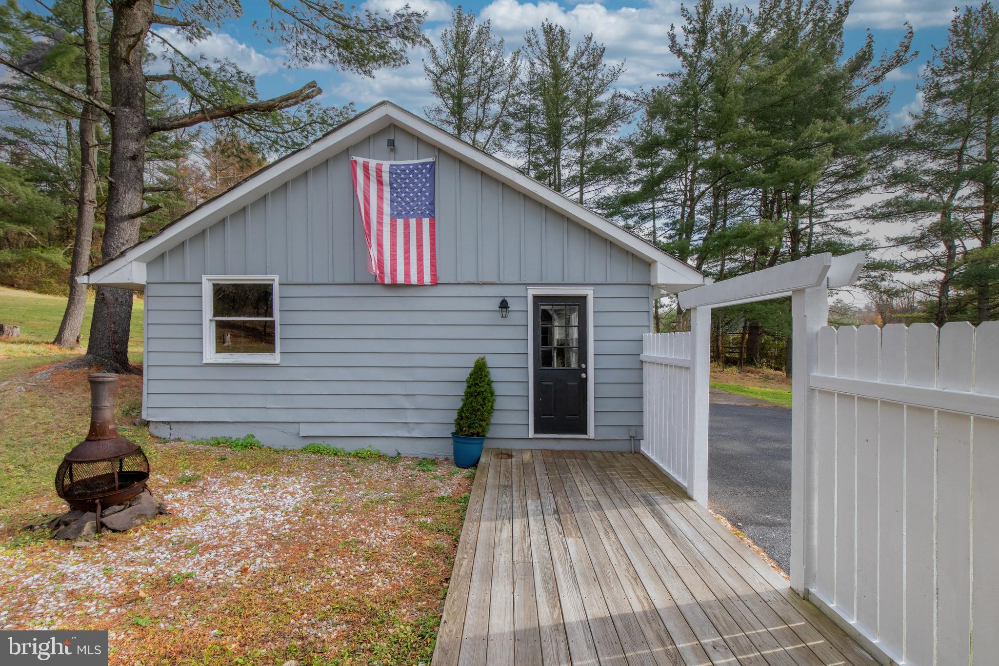 8979 Easton Road Ottsville, PA 18942 - Photo 36 of 39 a backyard of a house with seating space