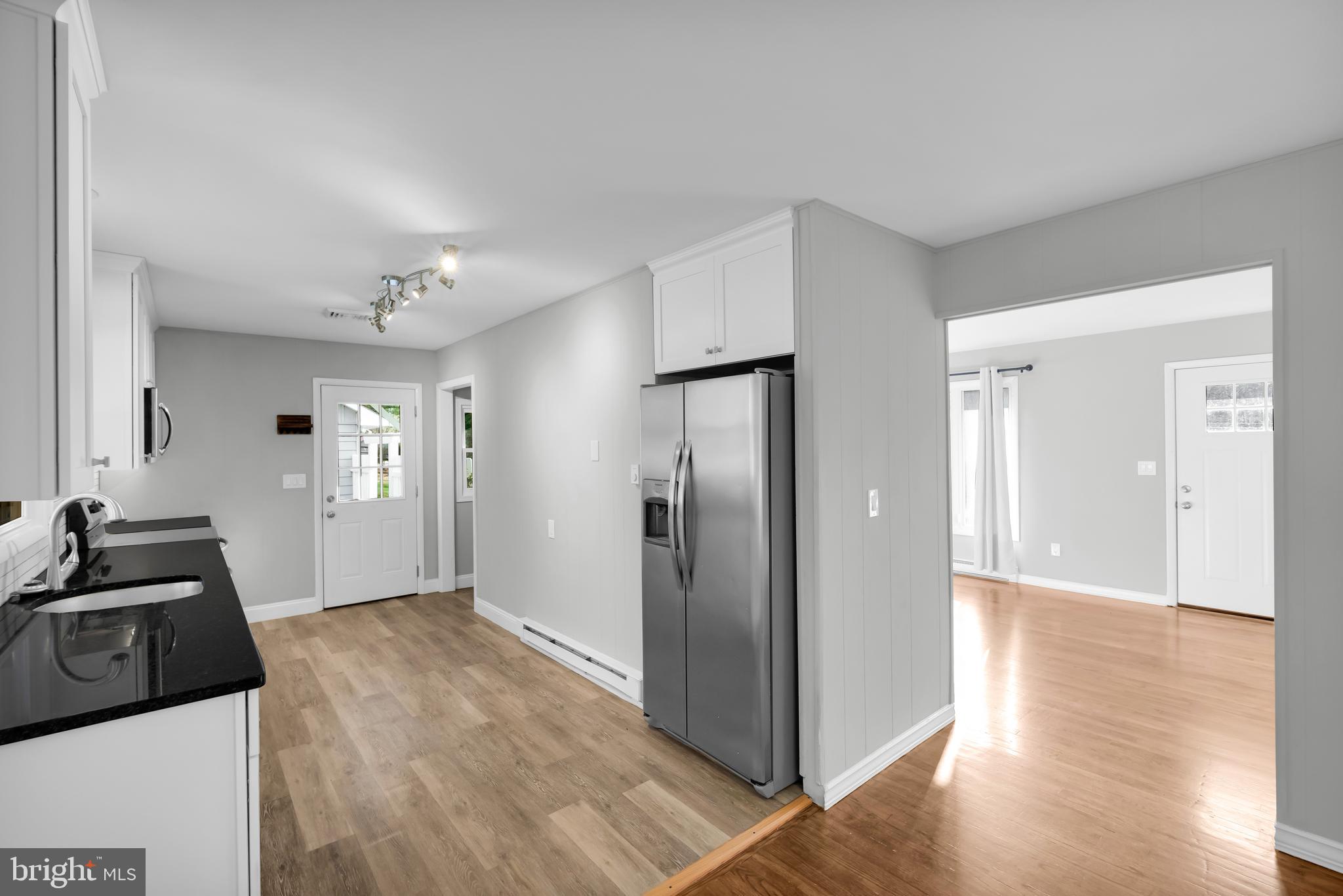 8979 Easton Road Ottsville, PA 18942 - Photo 8 of 39 a view of a kitchen cabinets and wooden floor
