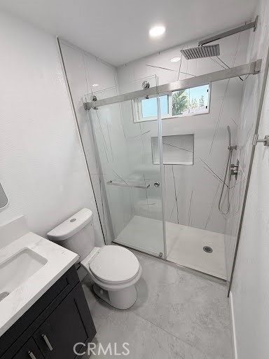 16586 Montego Way Tustin, CA 92780 - Photo 15 of 17 a bathroom with a toilet and a shower