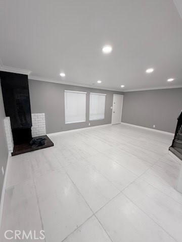 16586 Montego Way Tustin, CA 92780 - Photo 2 of 17 a view of an empty room with wooden floor