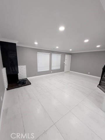 16586 Montego Way Tustin, CA 92780 - Photo 3 of 17 a view of an empty room with wooden floor