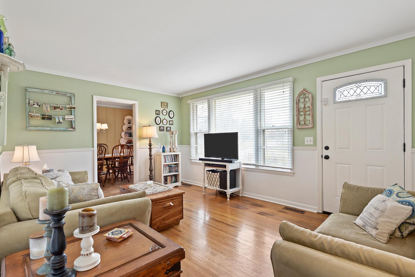 2407 Porter Road Nashville, TN 37206 - Photo 3 of 16 Bright open living room with original hardwoods and lots of charm.