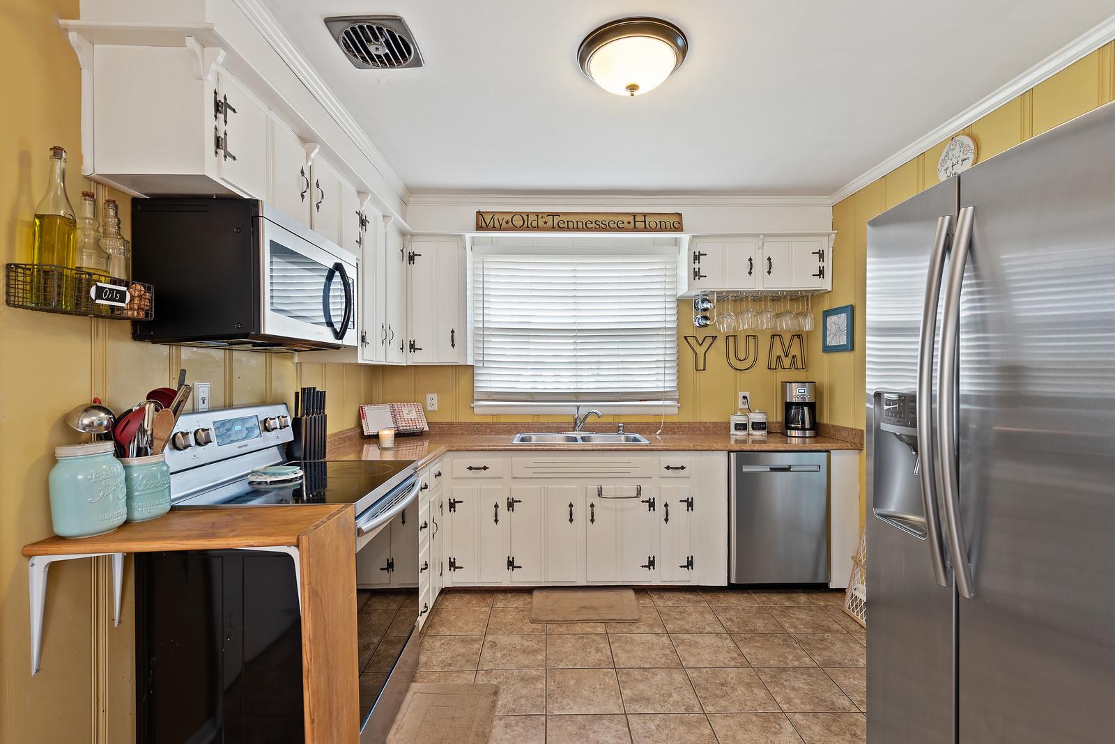 2407 Porter Road Nashville, TN 37206 - Photo 5 of 16 Kitchen is painted with newer appliances and open to dining room.