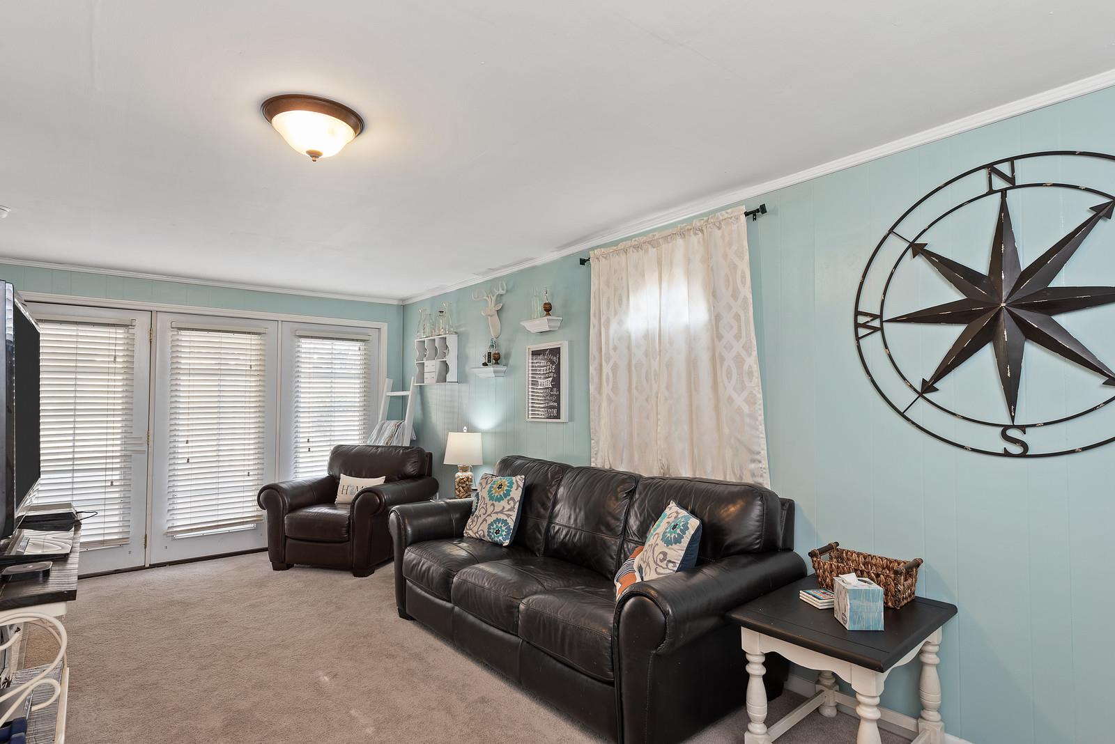 2407 Porter Road Nashville, TN 37206 - Photo 8 of 16 Den area is open to back carport/ back yard.